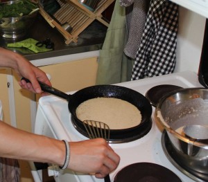 Joel preparing another pancake